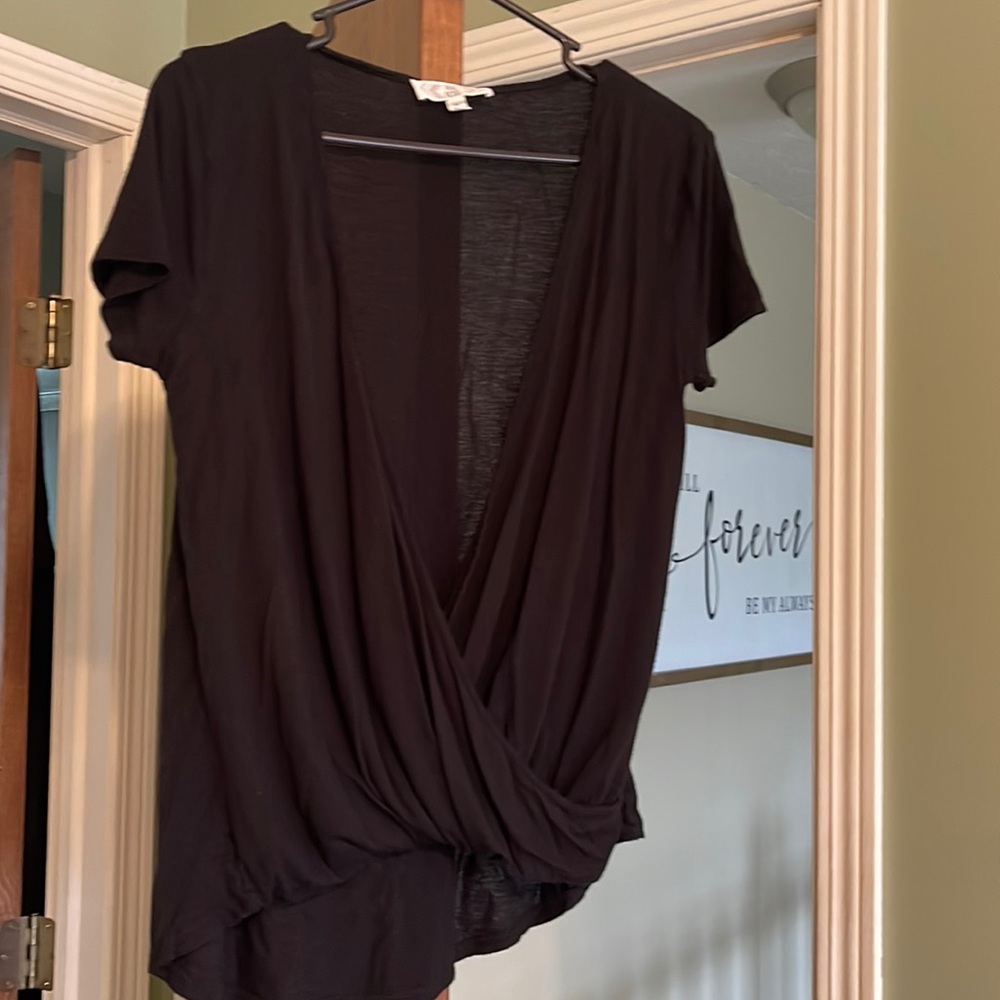 Pink Rose black wrap shirt in size Medium.